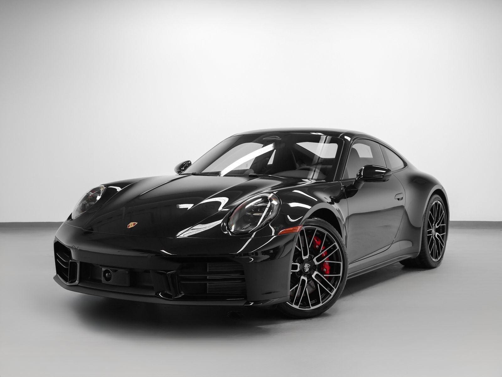 2026 Porsche 911 911 Carrera S in Jet Black Metallic — front three-quarter view